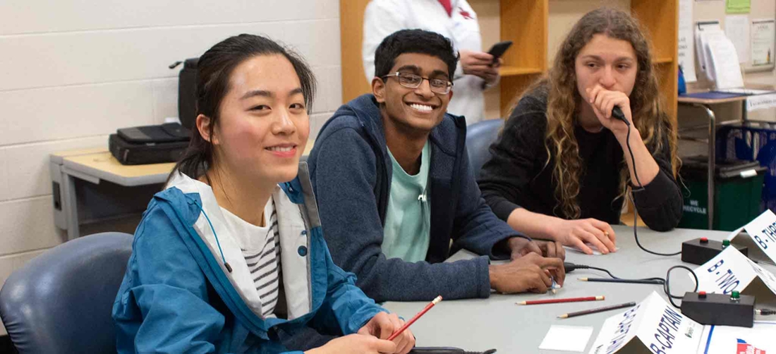 kids at table at science bowl